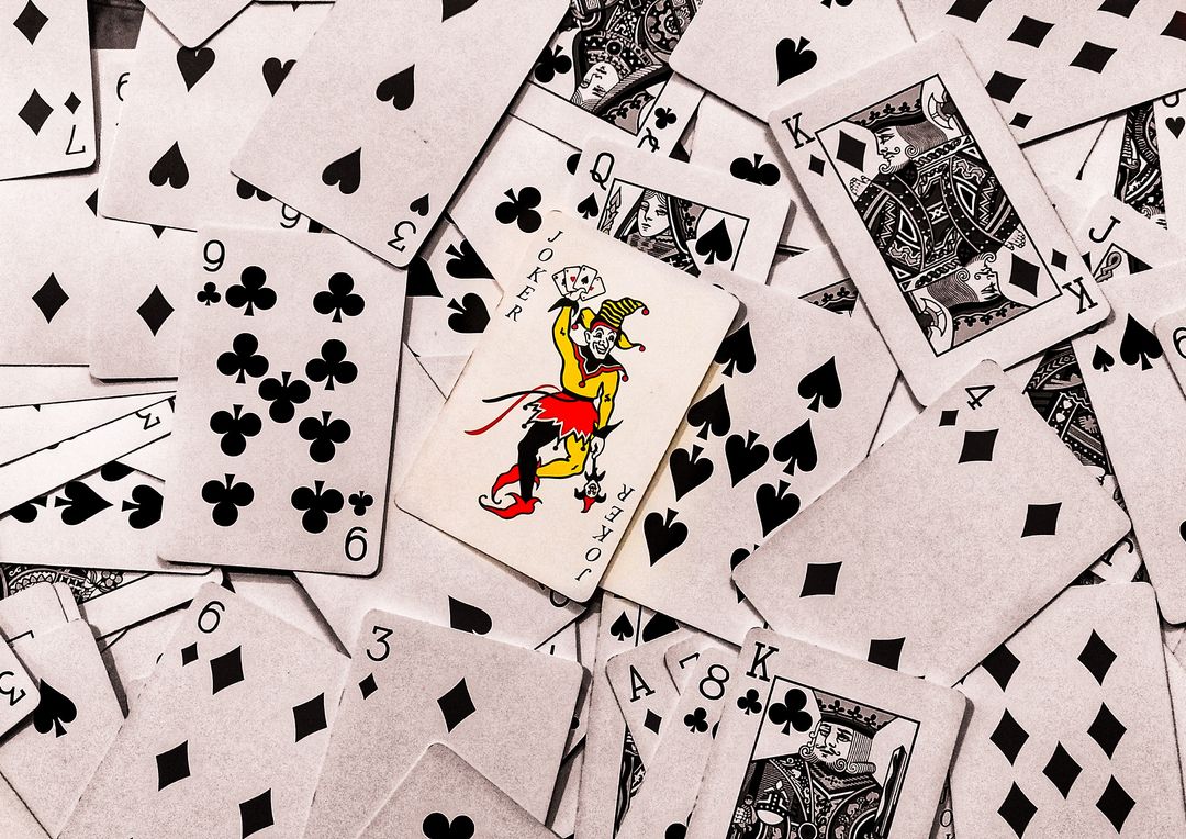 Joker on top of scattered cards